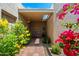Inviting entrance with a lovely tile walkway and bright desert flowers at 1725 E Staghorn Ln, Carefree, AZ 85377