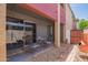Relaxing back patio with furniture, pavers and desert landscaping at 1730 W Emelita Ave # 1008, Mesa, AZ 85202