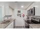 Modern kitchen features granite counters and stainless steel appliances, perfect for cooking enthusiasts at 1730 W Emelita Ave # 1008, Mesa, AZ 85202