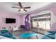 Comfortable living room with a large sliding door, vinyl flooring, and modern wall decor at 1730 W Emelita Ave # 1008, Mesa, AZ 85202