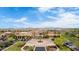 Expansive community center boasting a stunning entrance, meticulous landscaping, and ample parking at 18076 W Redwood Ln, Goodyear, AZ 85338