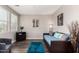 Bright living room with stylish decor and plenty of space for relaxation at 18076 W Redwood Ln, Goodyear, AZ 85338
