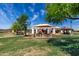Charming playground area featuring covered picnic spots, play structures, and open grassy areas, ideal for Gathering fun at 18076 W Redwood Ln, Goodyear, AZ 85338