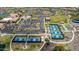 Overhead shot of community featuring pickleball courts, parking, and green spaces, enhancing recreational opportunities at 18076 W Redwood Ln, Goodyear, AZ 85338