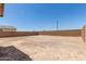 The expansive backyard is enclosed by a block wall, offering privacy at 18189 W Hess St, Goodyear, AZ 85338