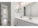 Bathroom featuring double sinks with modern fixtures at 18189 W Hess St, Goodyear, AZ 85338