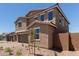 Beautiful two-story home with a three-car garage and low maintenance landscaping at 18189 W Hess St, Goodyear, AZ 85338