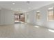 Spacious living room with ample natural light and backyard access at 18189 W Hess St, Goodyear, AZ 85338