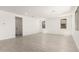 Bright, spacious living room featuring tile floors, recessed lighting and windows for plenty of natural light at 18189 W Hess St, Goodyear, AZ 85338