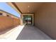 Covered patio featuring concrete flooring, with sliding glass door access to inside at 18189 W Hess St, Goodyear, AZ 85338