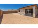 Backyard featuring a covered patio and plenty of space for outdoor activities at 18195 W Hess St, Goodyear, AZ 85338