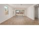 Bright and airy open-concept living space with sliding glass doors to the backyard at 18195 W Hess St, Goodyear, AZ 85338