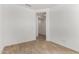 Cozy bedroom with neutral paint, tile flooring and modern updates for a serene living space at 18204 W Hess St, Goodyear, AZ 85338