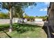 Lush backyard featuring a beautiful swimming pool, privacy landscaping, and a seating area at 19820 E Reins Rd, Queen Creek, AZ 85142