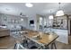Open dining and living area adjacent to the kitchen at 19820 E Reins Rd, Queen Creek, AZ 85142