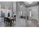 Bright dining room with a chandelier, tall ceilings, and elegant decor at 19820 E Reins Rd, Queen Creek, AZ 85142