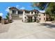 Inviting two-story home with a well-maintained yard and convenient two-car garage at 19820 E Reins Rd, Queen Creek, AZ 85142