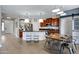 Spacious kitchen featuring stainless steel appliances, granite countertops, and an eat-in area at 19820 E Reins Rd, Queen Creek, AZ 85142