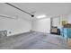 Spacious garage with ample storage space, and an automatic door at 2049 N 77Th Dr, Phoenix, AZ 85035