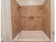 Tiled tub and shower combo with convenient built-in niche at 21817 N 39Th St, Phoenix, AZ 85050