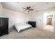 Neutral bedroom features a ceiling fan and plenty of natural light at 21817 N 39Th St, Phoenix, AZ 85050