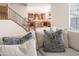 Inviting living room showcases a comfortable sectional and a glimpse into the gourmet kitchen at 21817 N 39Th St, Phoenix, AZ 85050