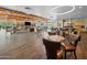 Spacious clubhouse lounge features a stone fireplace, seating areas, and a convenient kitchenette at 21817 N 39Th St, Phoenix, AZ 85050