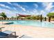 Beautiful community pool with plenty of lounge chairs available for relaxing in the sun at 21817 N 39Th St, Phoenix, AZ 85050