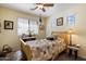 Bedroom featuring a large window and vintage-style decor at 26408 N 53Rd Gln, Phoenix, AZ 85083