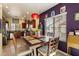 Bright dining area adjacent to the kitchen featuring a stylish table and chairs near the window at 26408 N 53Rd Gln, Phoenix, AZ 85083