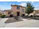 Charming two-story home with desert landscaping and a welcoming walkway to the front door at 26408 N 53Rd Gln, Phoenix, AZ 85083