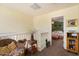 Loft featuring wicker seating and views of the bedroom below at 26408 N 53Rd Gln, Phoenix, AZ 85083