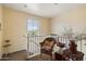 Loft with wicker seating, neutral walls, and natural light at 26408 N 53Rd Gln, Phoenix, AZ 85083