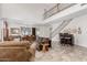 Open-concept living area with second story railing, dining area, and great room at 27289 N 90Th Ave, Peoria, AZ 85383