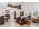Spacious living room with high ceilings, a railing, and an abundance of natural light at 27289 N 90Th Ave, Peoria, AZ 85383