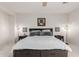 Main bedroom features ceiling fan, stylish decor, and ample space at 27289 N 90Th Ave, Peoria, AZ 85383