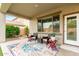 Relaxing covered patio with stylish seating area, perfect for outdoor entertaining and enjoying the fresh air at 27289 N 90Th Ave, Peoria, AZ 85383