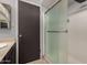 Bathroom featuring a sleek glass shower and neutral colored walls at 3106 S Extension Rd, Mesa, AZ 85210