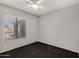 Well-lit bedroom with natural light and neutral walls at 3106 S Extension Rd, Mesa, AZ 85210