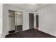 Bedroom featuring mirrored closet doors and easy access to the ensuite bathroom at 3106 S Extension Rd, Mesa, AZ 85210