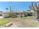 Charming single-story home boasting desert landscaping, offering curb appeal and low maintenance at 323 E Griswold Rd, Phoenix, AZ 85020