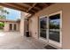 Covered back patio with view of a pool and a landscaped yard at 3255 E Malapai Dr, Phoenix, AZ 85028