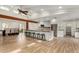 Bright kitchen featuring a large island with seating and modern appliances at 3255 E Malapai Dr, Phoenix, AZ 85028