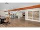 Spacious living room with hardwood floors and white walls open to the kitchen at 3255 E Malapai Dr, Phoenix, AZ 85028