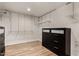Walk-in closet with adjustable shelving and a black dresser at 3255 E Malapai Dr, Phoenix, AZ 85028