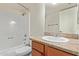 This bathroom features a shower-tub combo and granite vanity at 3500 N Hayden Rd # 1603, Scottsdale, AZ 85251