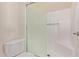 This bathroom features a white toilet and a shower stall with a frosted glass door at 3500 N Hayden Rd # 1603, Scottsdale, AZ 85251