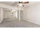 This carpeted bedroom has a ceiling fan and a mirrored closet at 3500 N Hayden Rd # 1603, Scottsdale, AZ 85251