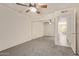 This bedroom features a ceiling fan, carpeted floors, and a mirrored closet at 3500 N Hayden Rd # 1603, Scottsdale, AZ 85251