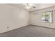 Bedroom with neutral carpet, a ceiling fan, and ample natural light at 3500 N Hayden Rd # 1603, Scottsdale, AZ 85251